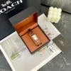 Coach Cadie 14504085 Women's Square Case Quartz Watch 17.5mm Stainless Steel Bracelet